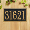 Rectangular black and gold custom address plaque with bold numbers, handcrafted in USA, designed to enhance curb appeal, featured in Home & Decor and Mailboxes and Address Signs collections.