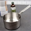 Heavy-duty stainless steel measuring pan with internal cup markings and a long handle, ideal for melting butter and cooking on the stovetop in Kitchen & Food, Cookware, and Baking Supplies collections.