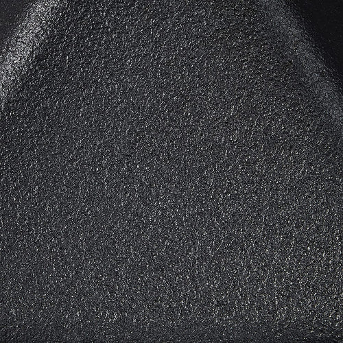 Close-up of the seasoned black cast iron surface with textured finish, showcasing durable craftsmanship ideal for Kitchen & Food, Cookware, Cast Iron, USA Made, and Best Sellers collections.