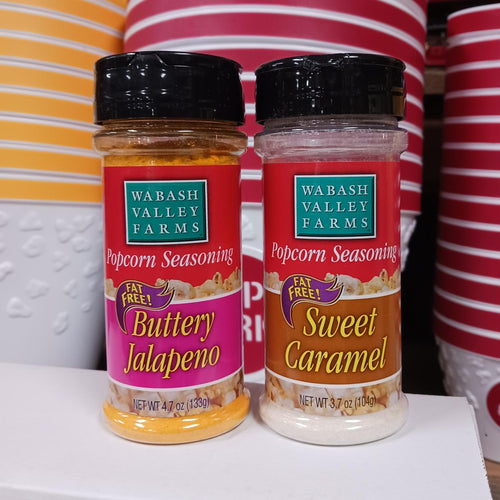Two handcrafted seasoning bottles from Wabash Valley Farms featuring Buttery Jalapeno and Sweet Caramel flavors, fat free and made in USA, in Kitchen & Food collections.