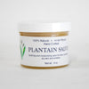 Small jar of handcrafted plantain salve made with an Amish recipe, featuring soothing and moisturizing properties for bites, scratches, and dry skin, USA made and health remedy favorite.