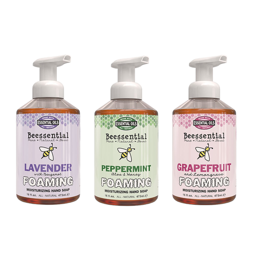 Three bottles of natural foaming hand soap in Lavender, Peppermint, and Grapefruit scents with colorful labels, part of USA Made health and wellness soap collections.