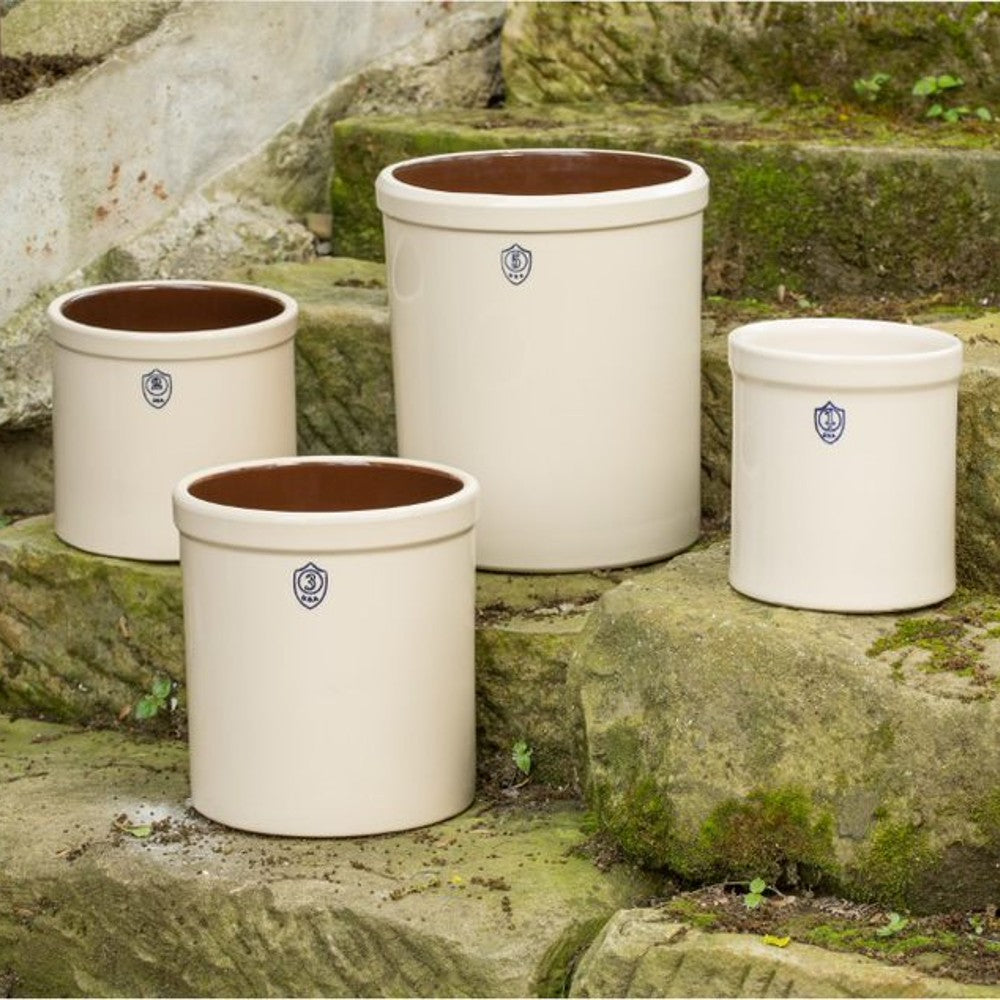 Set of handcrafted American stoneware crocks with classic cream glaze and stamped gallon numbers, perfect for fermenting and food preservation, featured in Home & Decor and Kitchen & Food collections.