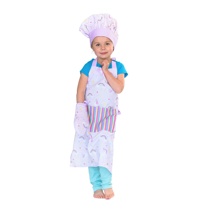 Child wearing a pastel apron, matching chef hat, and oven mitt with rainbow and unicorn designs, standing barefoot, ideal for Kitchen & Food, Children's Toys, and Arts and Crafts collections.