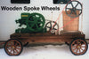 Wooden trailer with six-spoke wooden wheels, featuring a green 1.5 hp engine connected to a large wooden barrel, part of Specialty Equipment and Kitchen & Food collections.
