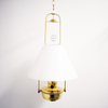 Handcrafted solid brass hanging bracket holding a classic oil lamp with white glass shade, displayed against a plain wall, ideal for Lamps & Lighting and Oil Lamps collections.