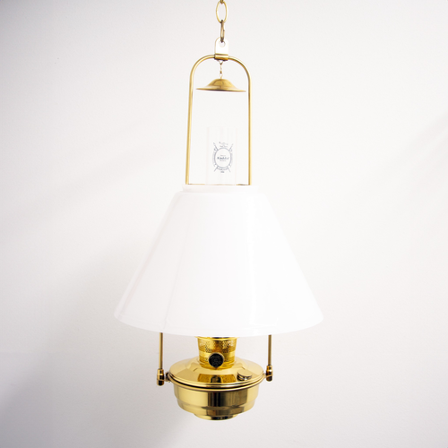Handcrafted solid brass hanging bracket holding a classic oil lamp with white glass shade, displayed against a plain wall, ideal for Lamps & Lighting and Oil Lamps collections.