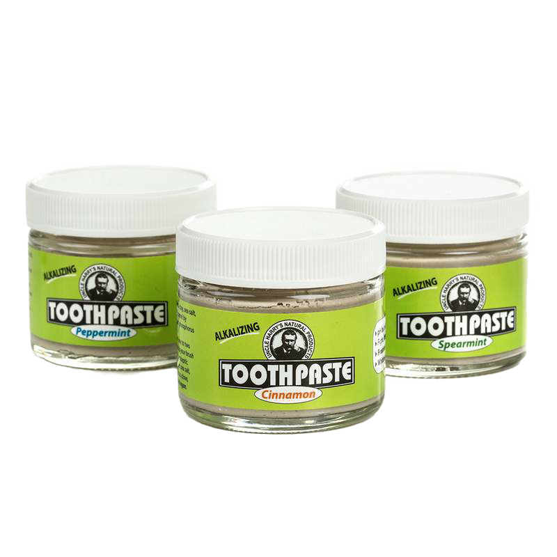 Three small glass jars of handcrafted all-natural alkalizing toothpaste in peppermint, cinnamon, and spearmint flavors with white lids, featured in Health & Wellness, Grooming and Personal Hygiene, USA Made, and Best Sellers collections.