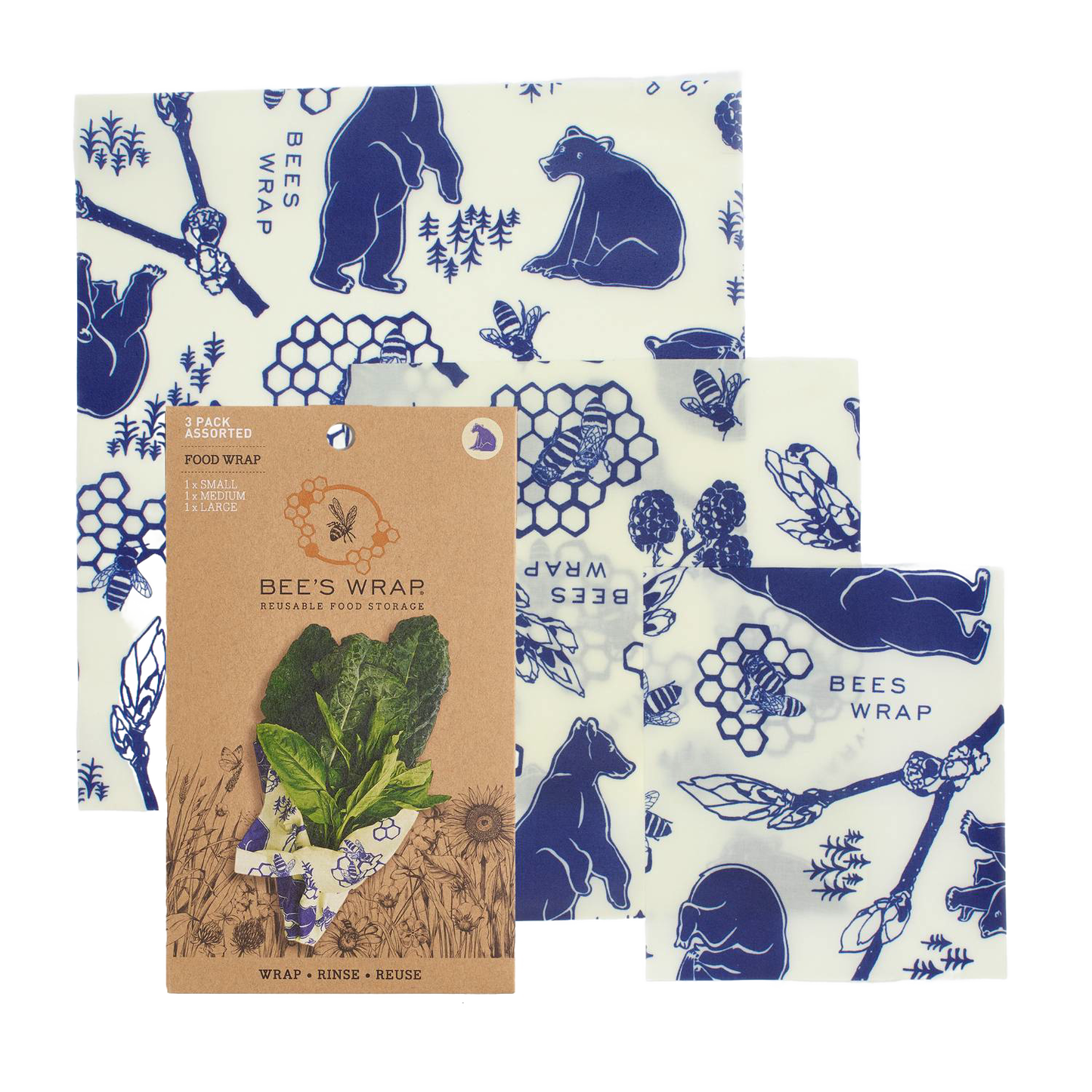 Three-piece set of handcrafted reusable food wraps in white with blue bear, bee, and honeycomb illustrations, eco-friendly and made in USA for Kitchen & Food and Storage and Serving collections.
