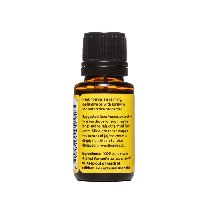 Amber glass bottle of pure steam-distilled frankincense essential oil with black cap and yellow label detailing calming, tonifying properties, made in USA, ideal for health remedies and wellness collections.
