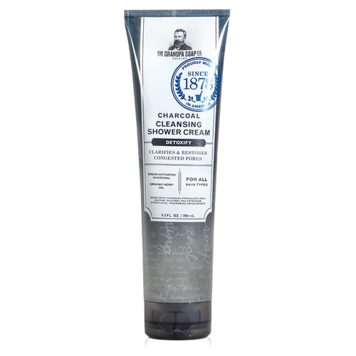 Tall gray and white tube of charcoal cleansing shower cream featuring detoxifying formula with steam-activated charcoal and organic hemp oil, from USA made health and wellness collection.