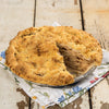 Hearty brown bag apple pie with thick layers of sliced apples and a crumbly golden topping, handcrafted in USA, perfect for kitchen, food, snacks, and best sellers collections.