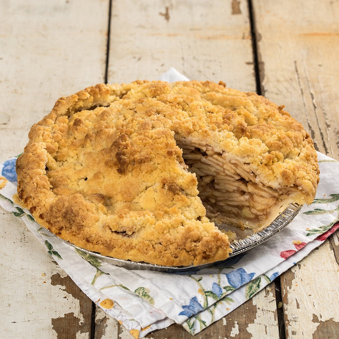 Hearty brown bag apple pie with thick layers of sliced apples and a crumbly golden topping, handcrafted in USA, perfect for kitchen, food, snacks, and best sellers collections.
