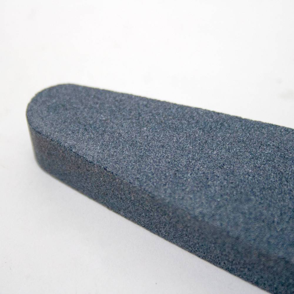 Elliptical silicon carbide whetstone with 150 grit coarse surface, designed for sharpening scythe blades and various garden tools, featured in Farm, Garden & Tool and Lawncare collections.