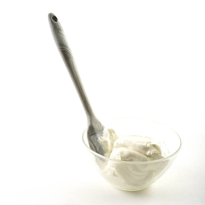 Marble-patterned flexible silicone spatula stirring whipped ingredients in a clear glass bowl, crafted for Kitchen & Food, Cookware, Baking Supplies, and Kitchen Gadgets collections.