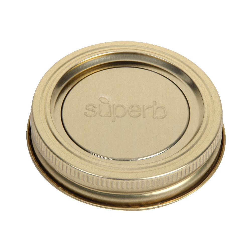 Single gold-tone metal canning jar lid embossed with Superb branding, part of a pack of 12 crafted in USA for food preservation, Kitchen & Food, and Best Sellers collections.