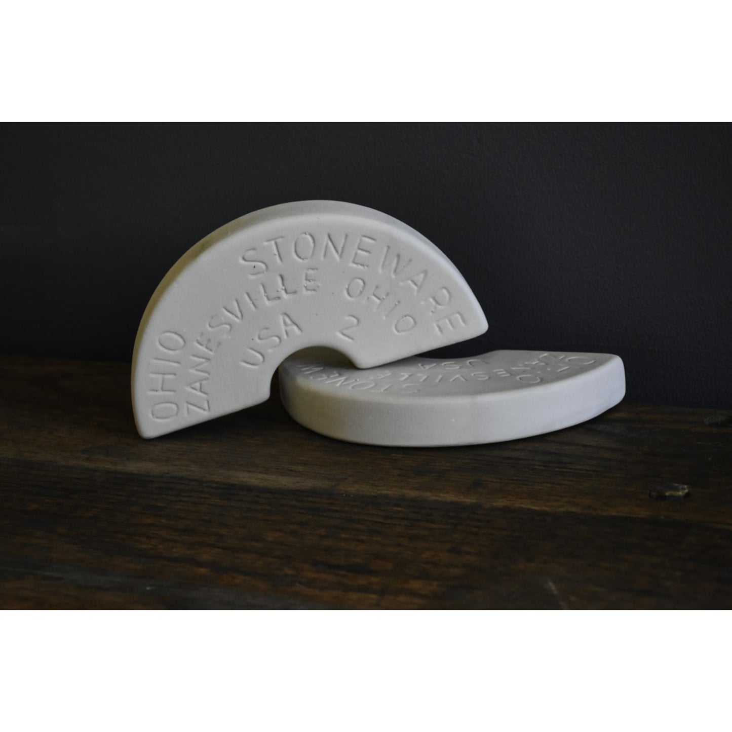 Two handcrafted stoneware weight stones made in the USA, designed to fit numbered crocks and keep food submerged during fermenting and pickling in Kitchen & Food, Food Preservation, and USA Made collections.