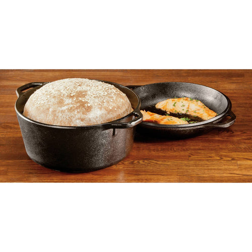 Handcrafted black cast iron Dutch oven with extra deep lid used as a skillet, featuring freshly baked bread and cooked salmon, ideal for Kitchen & Food, Cookware, Cast Iron, USA Made, Best Sellers, and Promo Eligible collections.