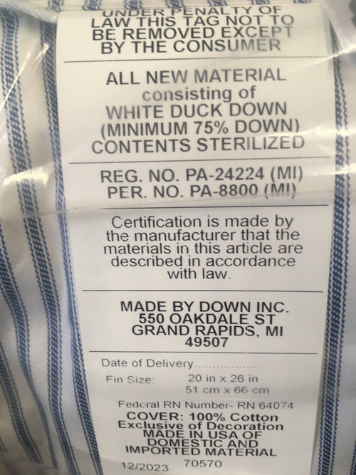 Close-up image of a product tag detailing white duck down filling with minimum 75% down, sterilized contents, 100% cotton cover, and manufacturing information from Grand Rapids, Michigan, suitable for Home & Decor, Home Textiles, Best Sellers, and Promo Eligible collections.