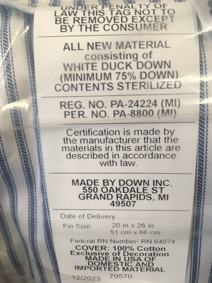 Close-up image of a product tag detailing white duck down filling with minimum 75% down, sterilized contents, 100% cotton cover, and manufacturing information from Grand Rapids, Michigan, suitable for Home & Decor, Home Textiles, Best Sellers, and Promo Eligible collections.