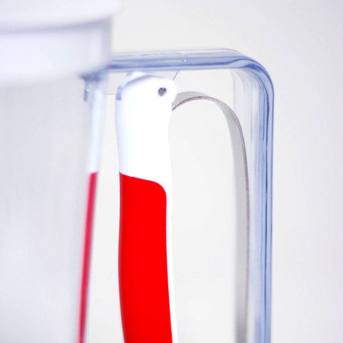 Clear batter dispenser with a soft red grip handle for easy, precise pouring, designed for Kitchen & Food, Kitchen Gadgets, Cooking and Baking Helpers, Best Sellers, and Promo Eligible collections.