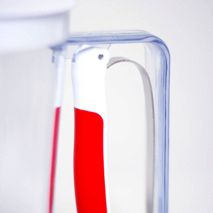 Clear batter dispenser with a soft red grip handle for easy, precise pouring, designed for Kitchen & Food, Kitchen Gadgets, Cooking and Baking Helpers, Best Sellers, and Promo Eligible collections.