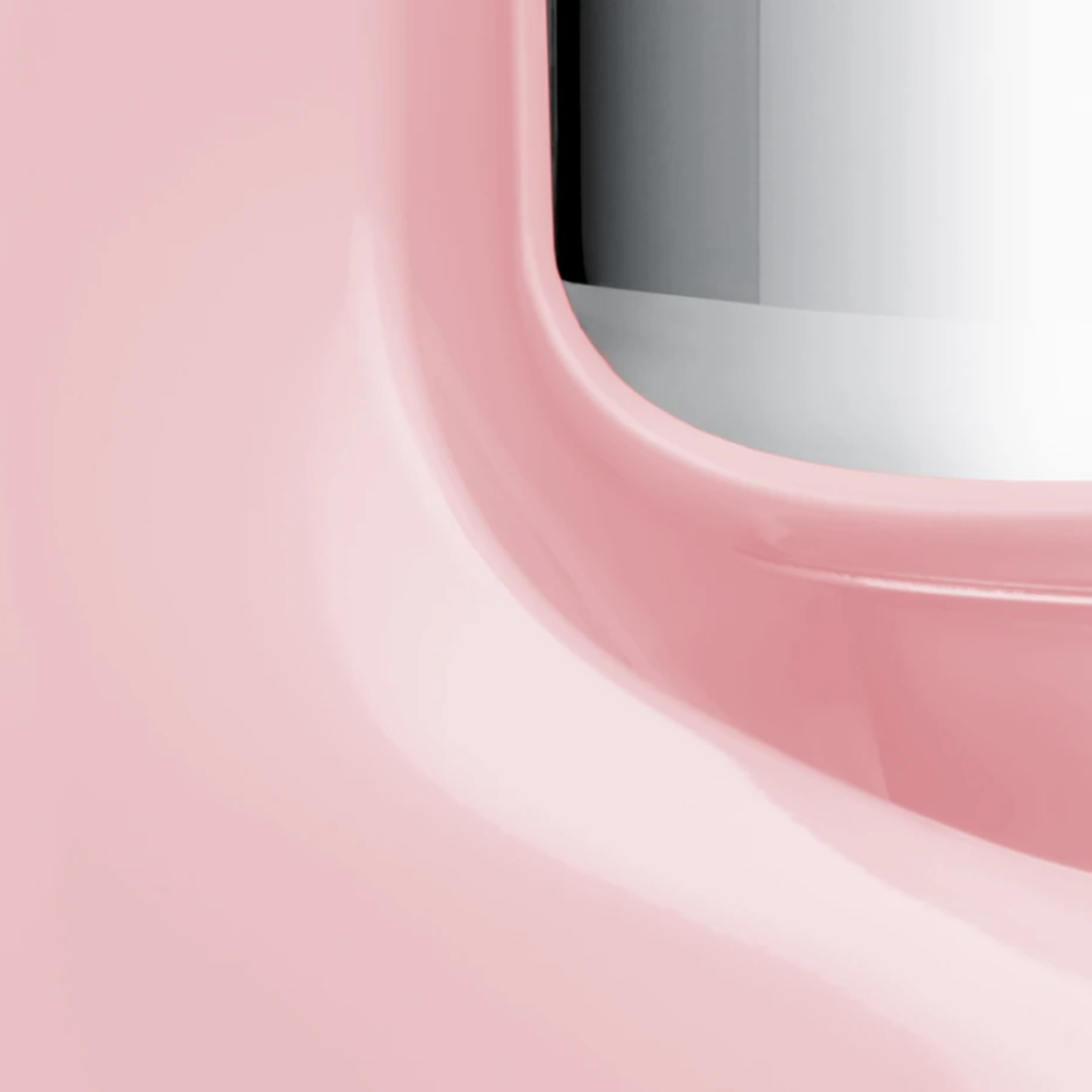 Close-up of a handcrafted soft pink stand mixer base with a smooth, glossy finish and part of a polished stainless steel bowl, featured in Kitchen & Food and Baking Supplies collections.