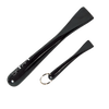 Set of two sleek, hard resin cleaning tools with smooth black finish, designed for faster cleanup on glass-top stoves, cookware, and hardwood floors, featured in household cleaning collections.