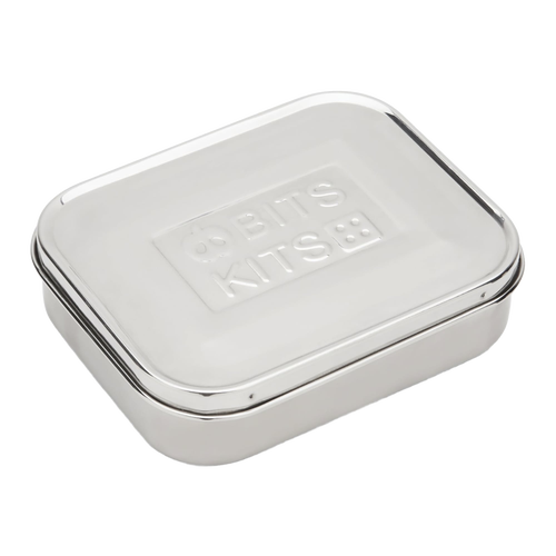 Closed rectangular stainless steel snack container featuring a smooth finish and embossed lid design, suitable for Kitchen & Food, Storage and Serving, Best Sellers, and Promo Eligible collections.