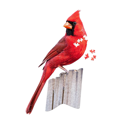 Bright red cardinal bird perched on a puzzle-shaped base with several puzzle pieces floating nearby, part of Toys, Books & Games and Puzzles collections.