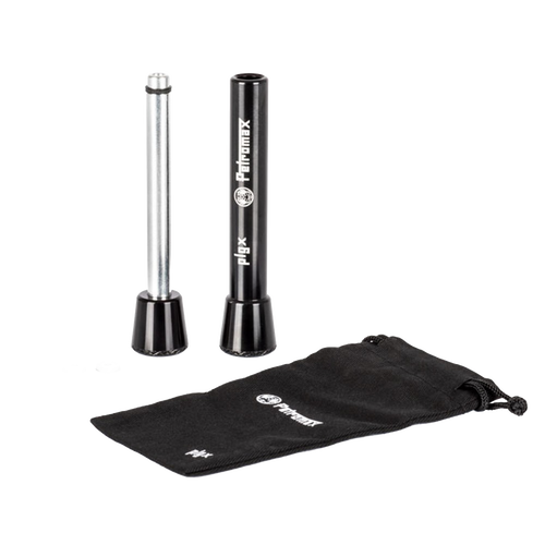 Camping firestarter tool with a cylindrical metal plunger and black outer casing, accompanied by small parts and a branded black drawstring pouch, ideal for farm, garden, and emergency use.