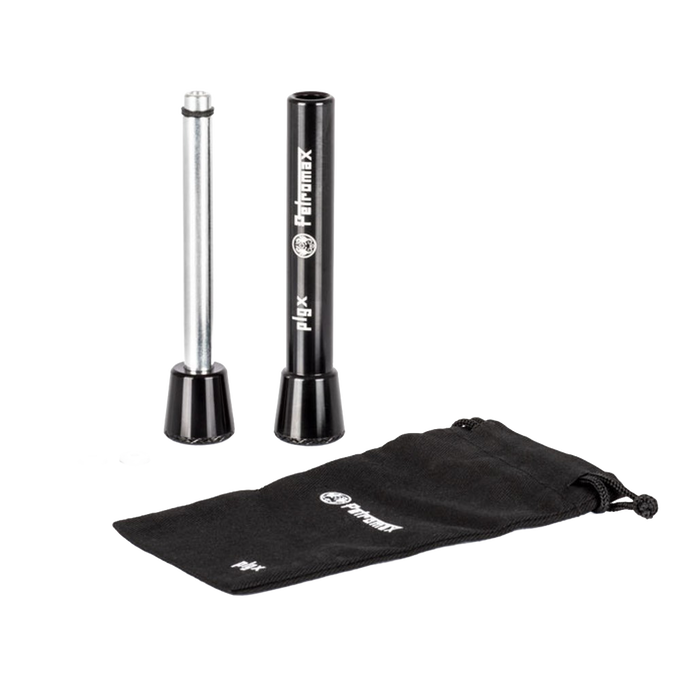 Camping firestarter tool with a cylindrical metal plunger and black outer casing, accompanied by small parts and a branded black drawstring pouch, ideal for farm, garden, and emergency use.