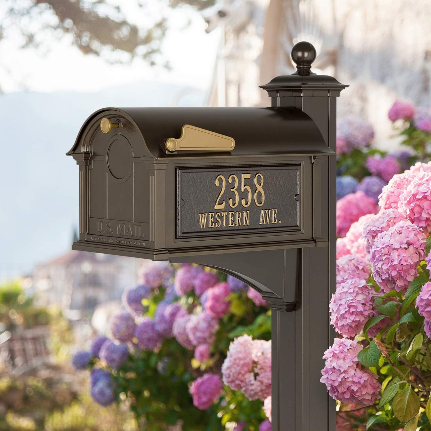 Handcrafted bronze and gold mailbox with personalized address plaque mounted on a decorative post, part of USA Made collections including Home & Decor and Mailboxes and Address Signs.
