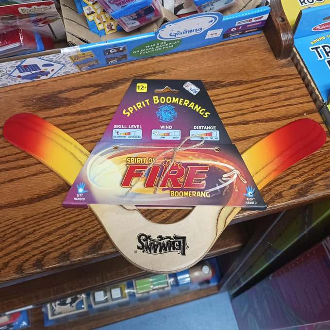 Handmade wooden boomerang with red and yellow tips, designed for right-handers, flying up to 35 yards, featured in Toys, Books & Games, USA Made, Lawn Games, and Best Sellers collections.