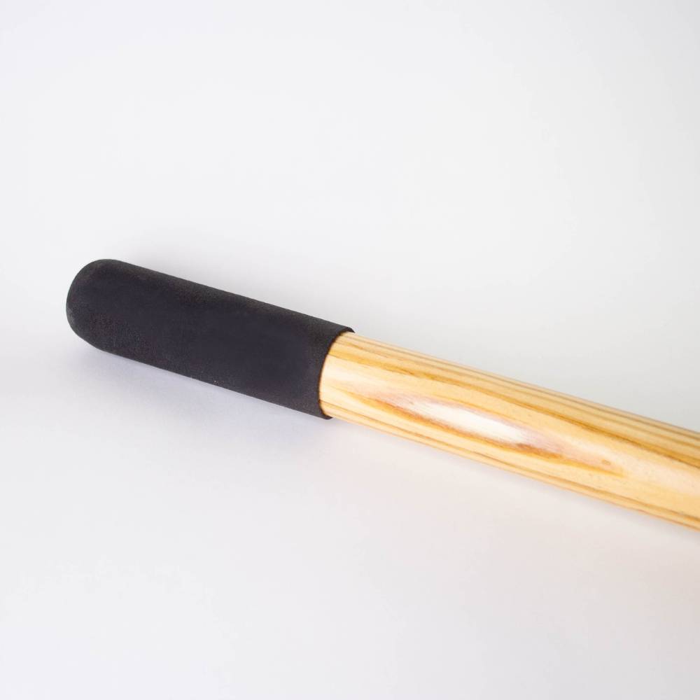 Close-up of a smooth wooden handle with a black rubber grip, part of a handcrafted digging tool from the Farm, Garden & Tool and Hand Tools and Hardware collections.