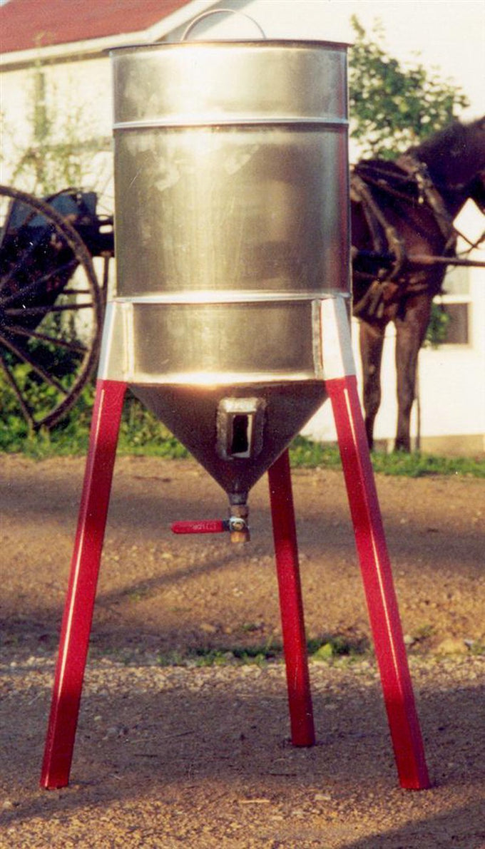 Handcrafted stainless steel cream separator with rust-proof finish and red sturdy legs, made in USA, perfect for farm, garden, and animal care use.