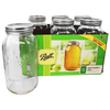 Set of six clear wide-mouth half-gallon glass canning jars with metal lids and bands, made in USA, suitable for kitchen food preservation, canning, and decorative crafts.