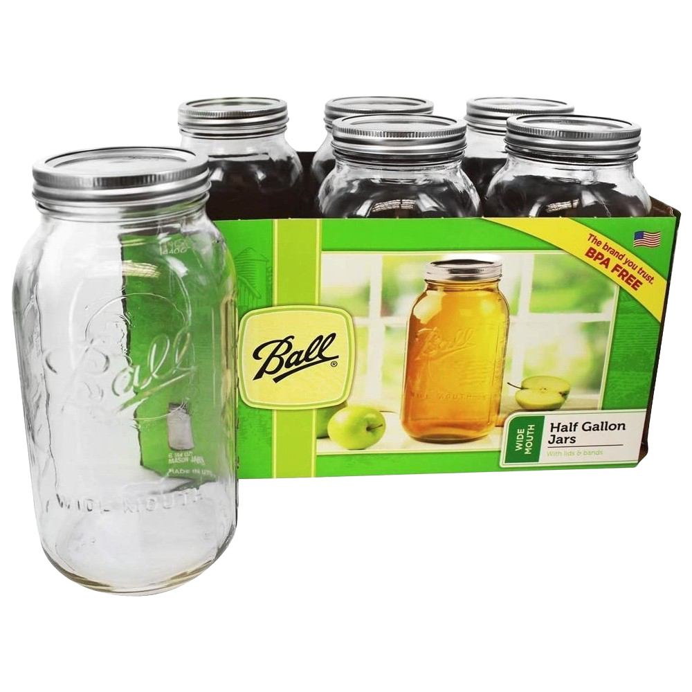 Set of six clear wide-mouth half-gallon glass canning jars with metal lids and bands, made in USA, suitable for kitchen food preservation, canning, and decorative crafts.