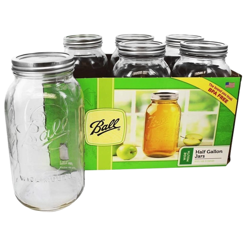Set of six clear wide-mouth half-gallon glass canning jars with metal lids and bands, made in USA, suitable for kitchen food preservation, canning, and decorative crafts.