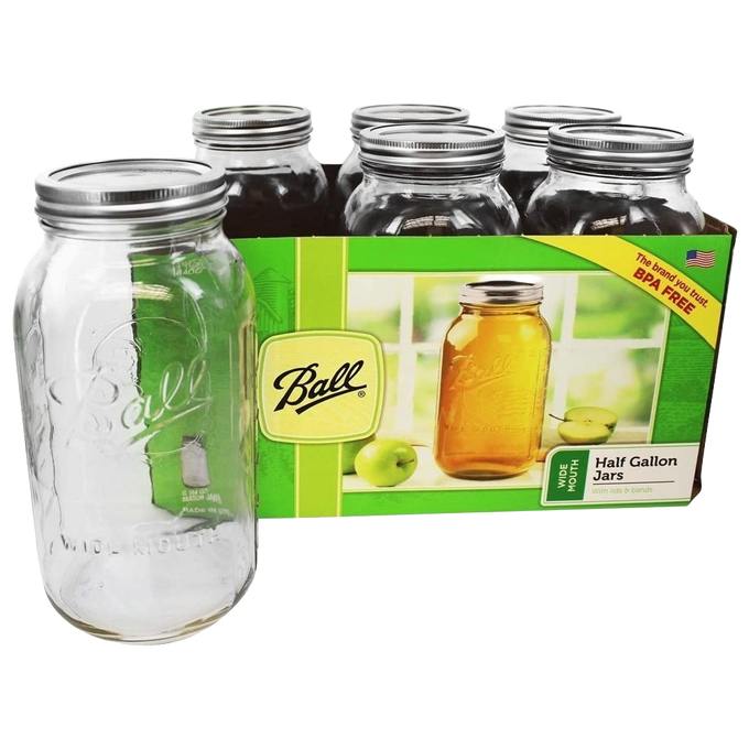 Set of six clear wide-mouth half-gallon glass canning jars with metal lids and bands, made in USA, suitable for kitchen food preservation, canning, and decorative crafts.