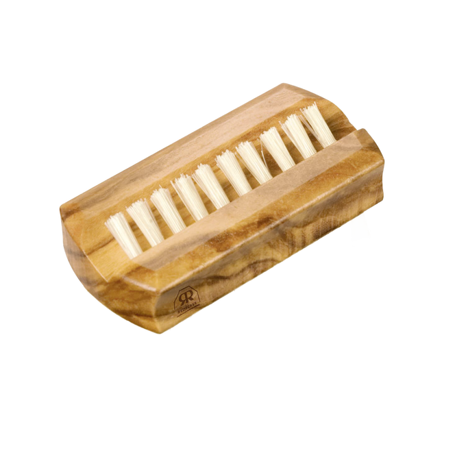 Compact beechwood nail cleaner with firm light bristles, handcrafted for effective nail hygiene on the go, featured in Health & Wellness, Grooming, and Best Sellers collections.