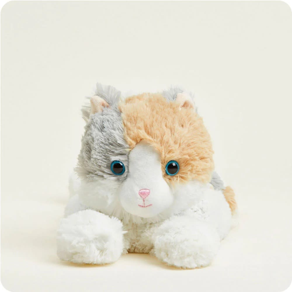 Microwaveable and weighted plush cat with soft tricolor fur and bright blue eyes, scented with dried lavender, perfect for children's toys, health remedies, and indoor play collections.