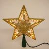 Lighted golden star tree topper with intricate scroll design and built-in warm lights, adding elegant charm to holiday decor, featured in Home & Decor and Best Sellers collections.