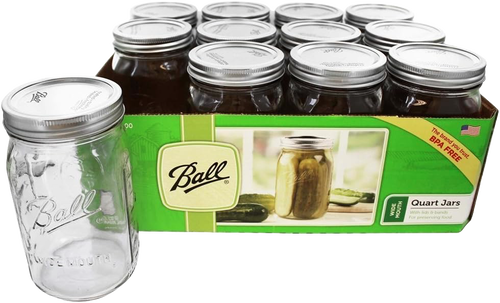 Set of 12 wide-mouth quart canning jars with metal lids and bands, crafted in the USA, ideal for kitchen, food preservation, and canning accessories collections.