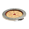 Aluminum pie crust shield placed around the edges of a golden brown pie with decorative slits and a heart-shaped center cutout, protecting the crust from burning during baking.