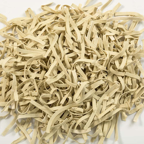 Close-up of hand-cut gluten-free egg noodles with a homestyle texture, crafted in the USA, featured in Kitchen & Food, Pantry, Gluten Free, and Best Sellers collections.