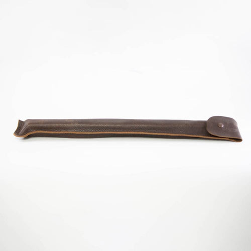 Handcrafted dark brown leather sheath with stitched edges and button closure, designed to protect and carry wood cutting tools in Farm, Garden & Tool and Wood Cutting and Hauling collections.