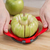 Hard plastic apple slicer with stainless steel blades cutting a green apple into sixteen thin, uniform wedges, ideal for baking and snacking in kitchen and garden tool collections.