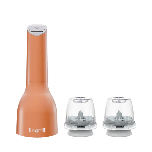 Battery-operated FinaMill grinder in rust-orange with two clear interchangeable grinding pods, designed for easy one-handed use, ideal for Kitchen & Food and Kitchen Gadgets collections.