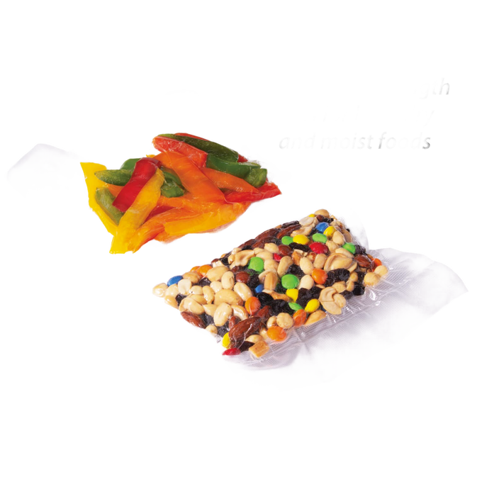 Two vacuum-sealed clear plastic bags containing mixed nuts, candy pieces, and sliced bell peppers, highlighting food preservation and storage efficiency.